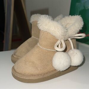 Cozy Tan Baby Booties with Pom Poms
